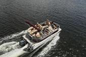 Starcraft LX 22 R pontoon under power on the water