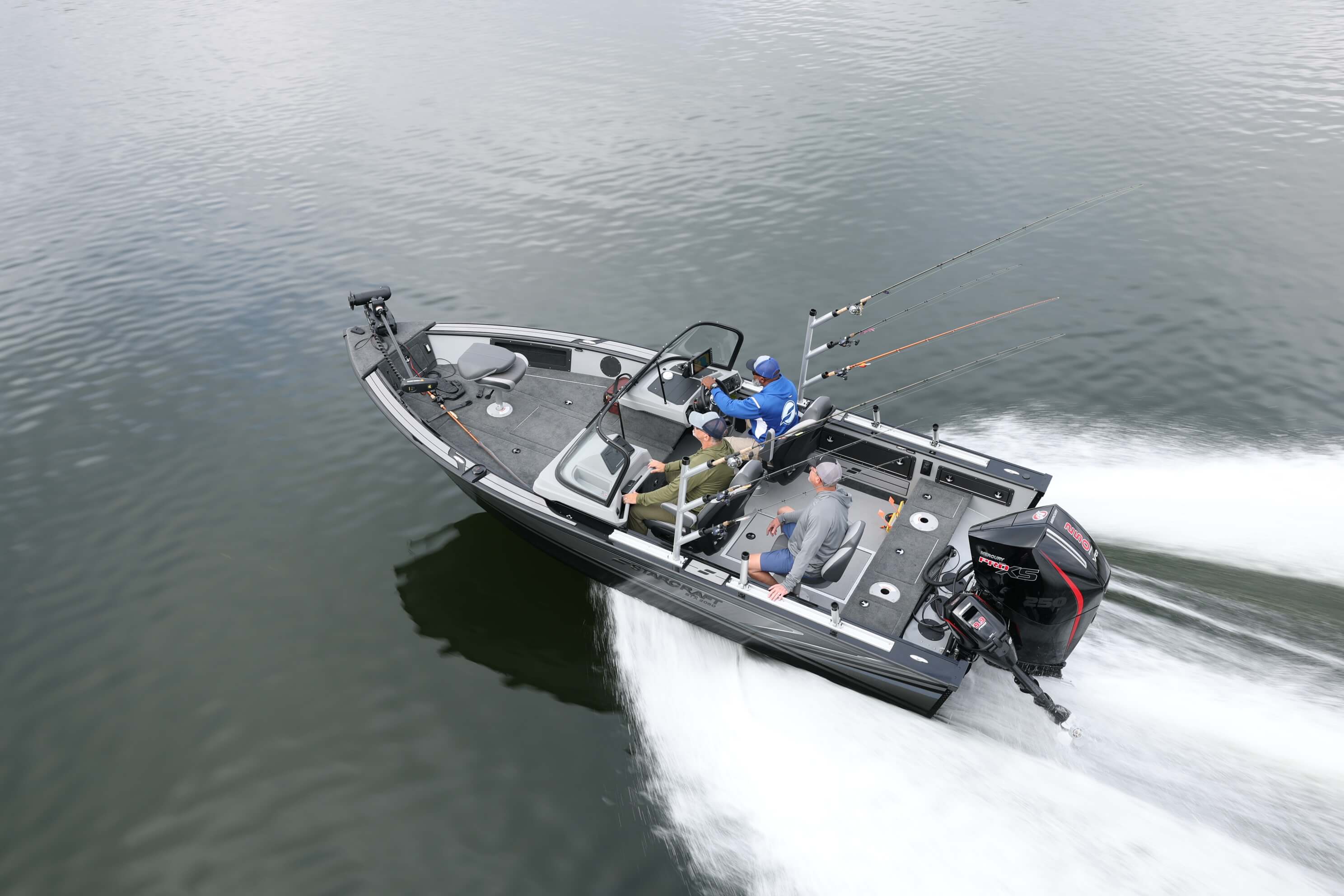 Aerial view of a Starcraft STX 2050 turning at speed with a white wake and two anglers on board