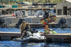 Kawasaki Jet Ski Ultra 160LX parked at a dock, three-quarter front view