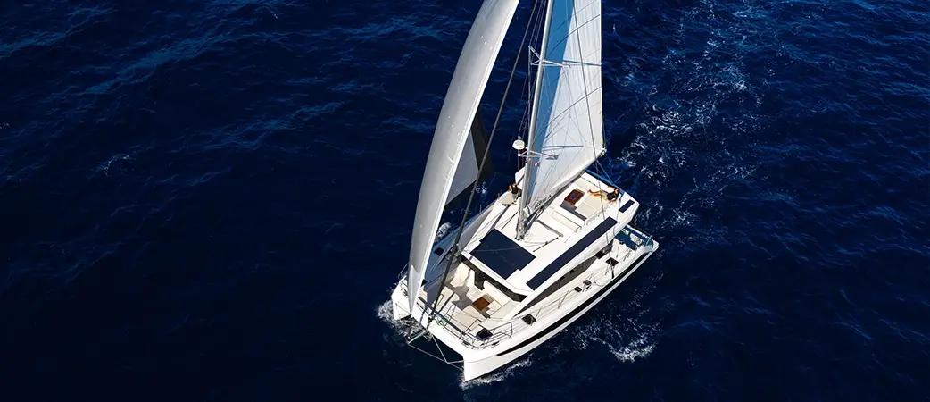 Aerial view of the Aquila 45 Sail sailing with mainsail and genoa set