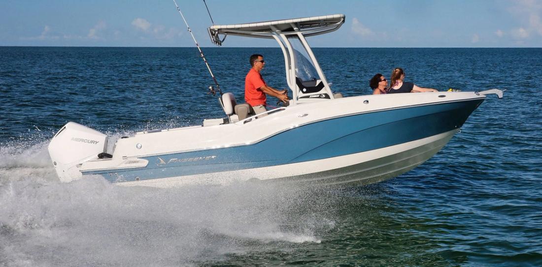 Crownline Finseeker 220 CC centre console under way with a family aboard