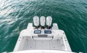 Bertram 39CC aerial view of the cockpit and triple Mercury outboards