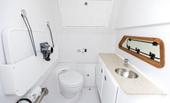 Bertram 28CC console head with toilet, vanity and sink