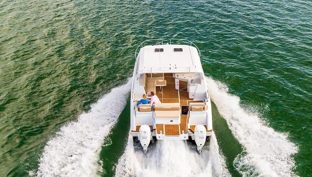 Aquila 36 Sport running at speed from astern