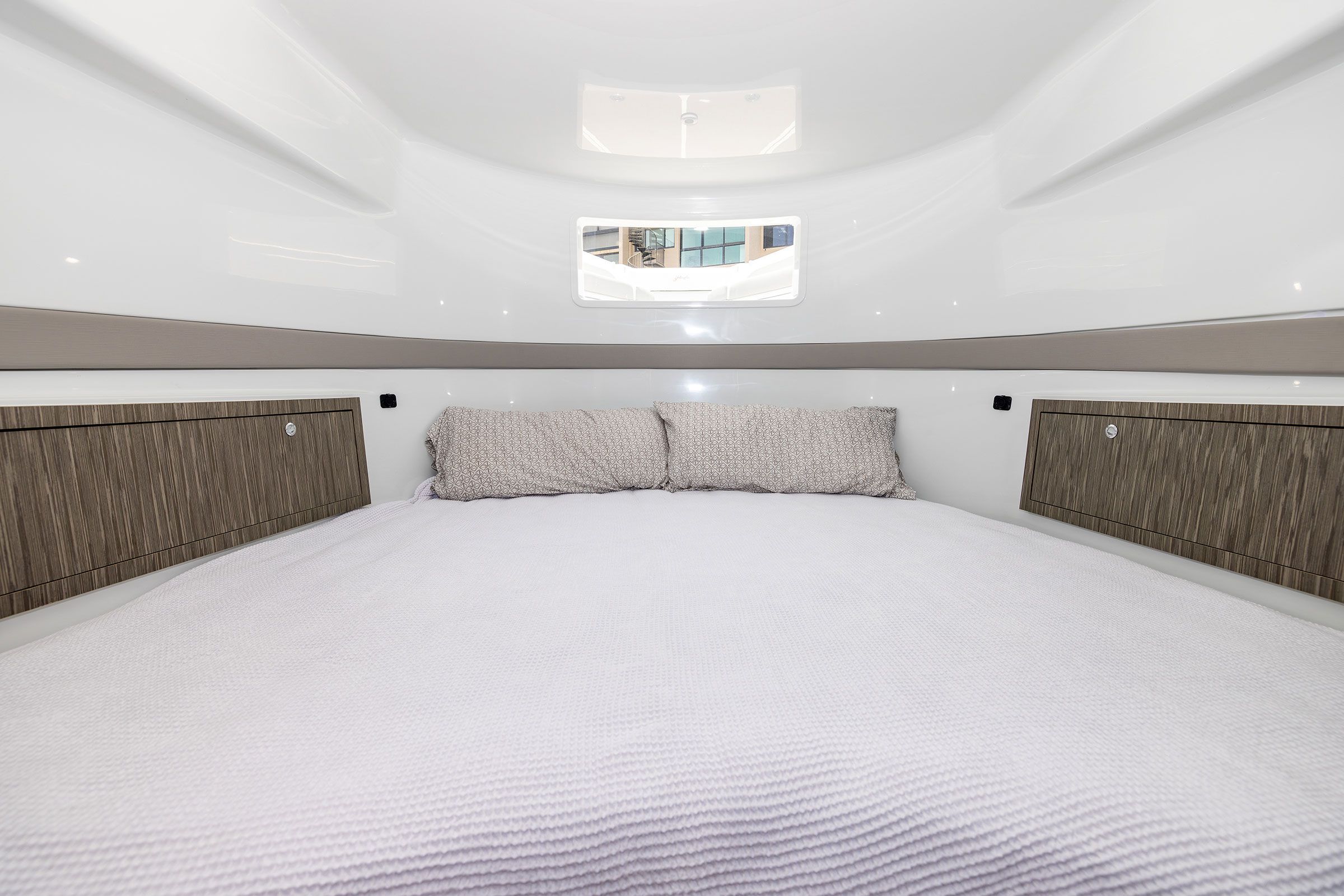 Queen berth in the cabin of the Yellowfin 54 Offshore