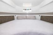Queen berth in the cabin of the Yellowfin 54 Offshore