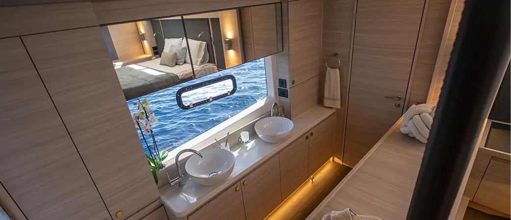 Aquila 46 Yacht owner's suite bathroom with twin basins