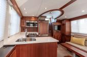 American Tug 435 galley with solid-surface counters