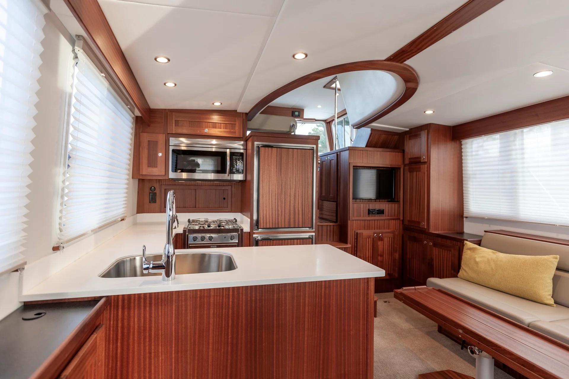 American Tug 435 galley with solid-surface counters