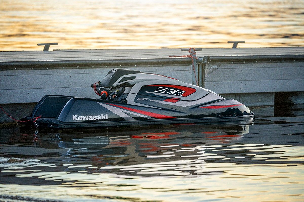 Kawasaki Jet Ski SX-R 160 parked near a dock, side angle