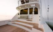 Bertram 61 Convertible cockpit with mezzanine lounge and teak deck
