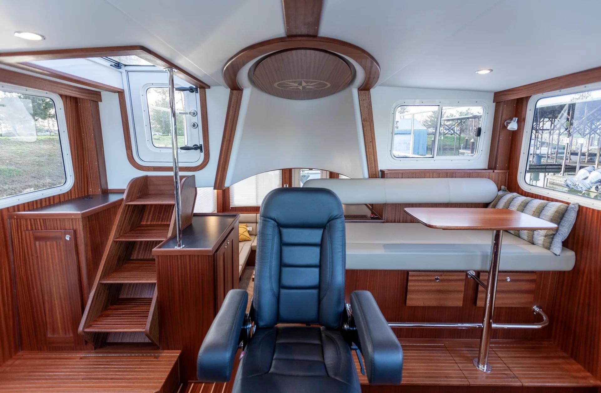American Tug 435 pilothouse with helm chair and settee