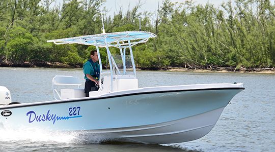 2015 Dusky 227XF w/Deco Boat Lift