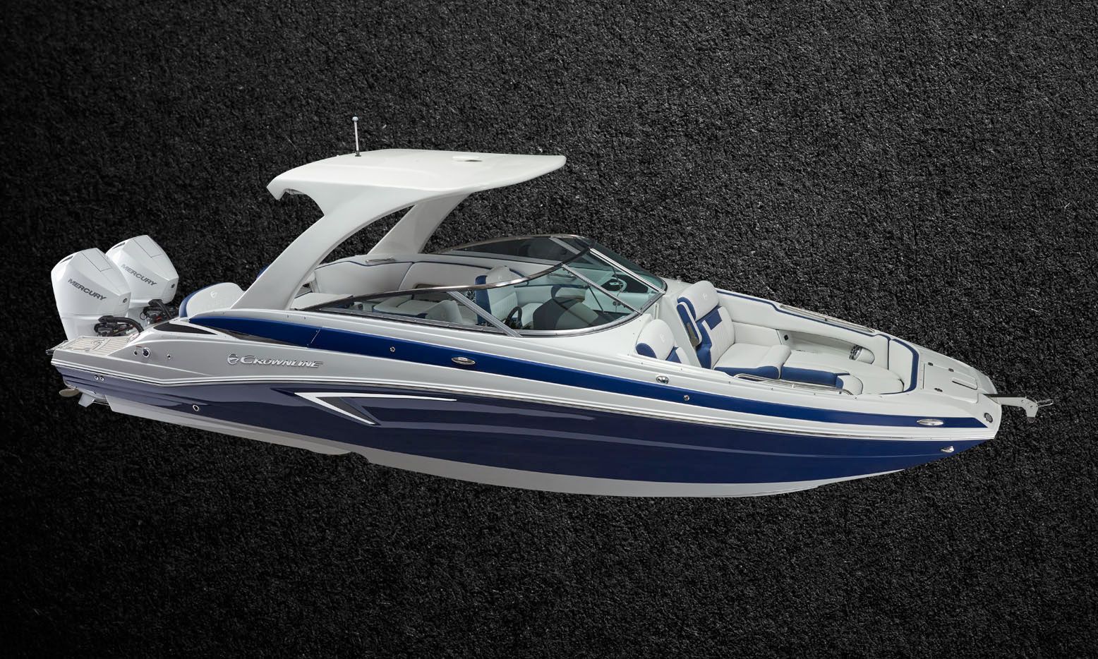 Crownline E305 XS twin-outboard bowrider with hard top, bow-quarter studio view
