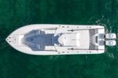 Aerial view of the Yellowfin 32 Offshore showing the open deck and twin outboards