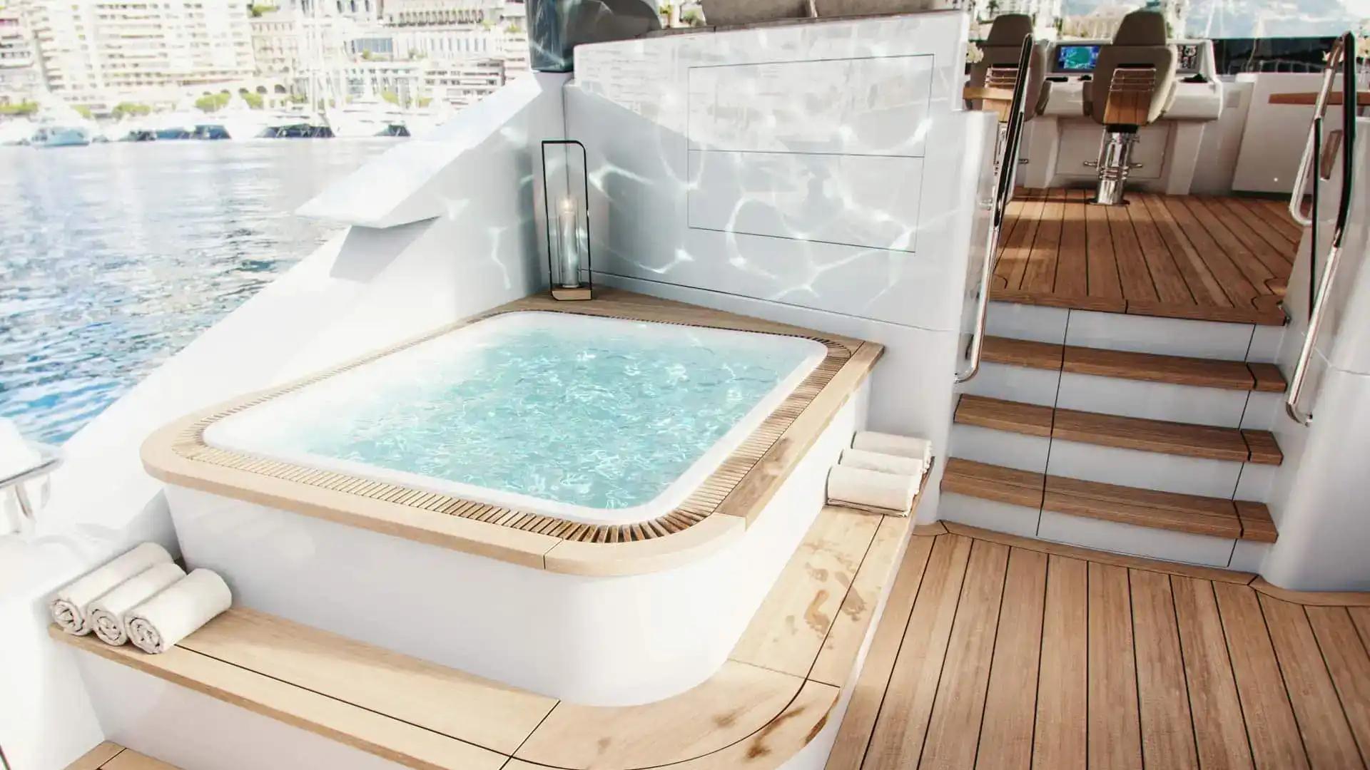 Westport 135 flybridge spa pool beside the helm and teak steps