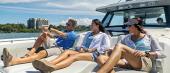 Guests relaxing on the Aquila 47 Molokai forward seating