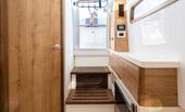 Bertram 39CC head with vanity, wood cabinetry and teak shower grate