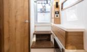 Bertram 39CC head with vanity, wood cabinetry and teak shower grate