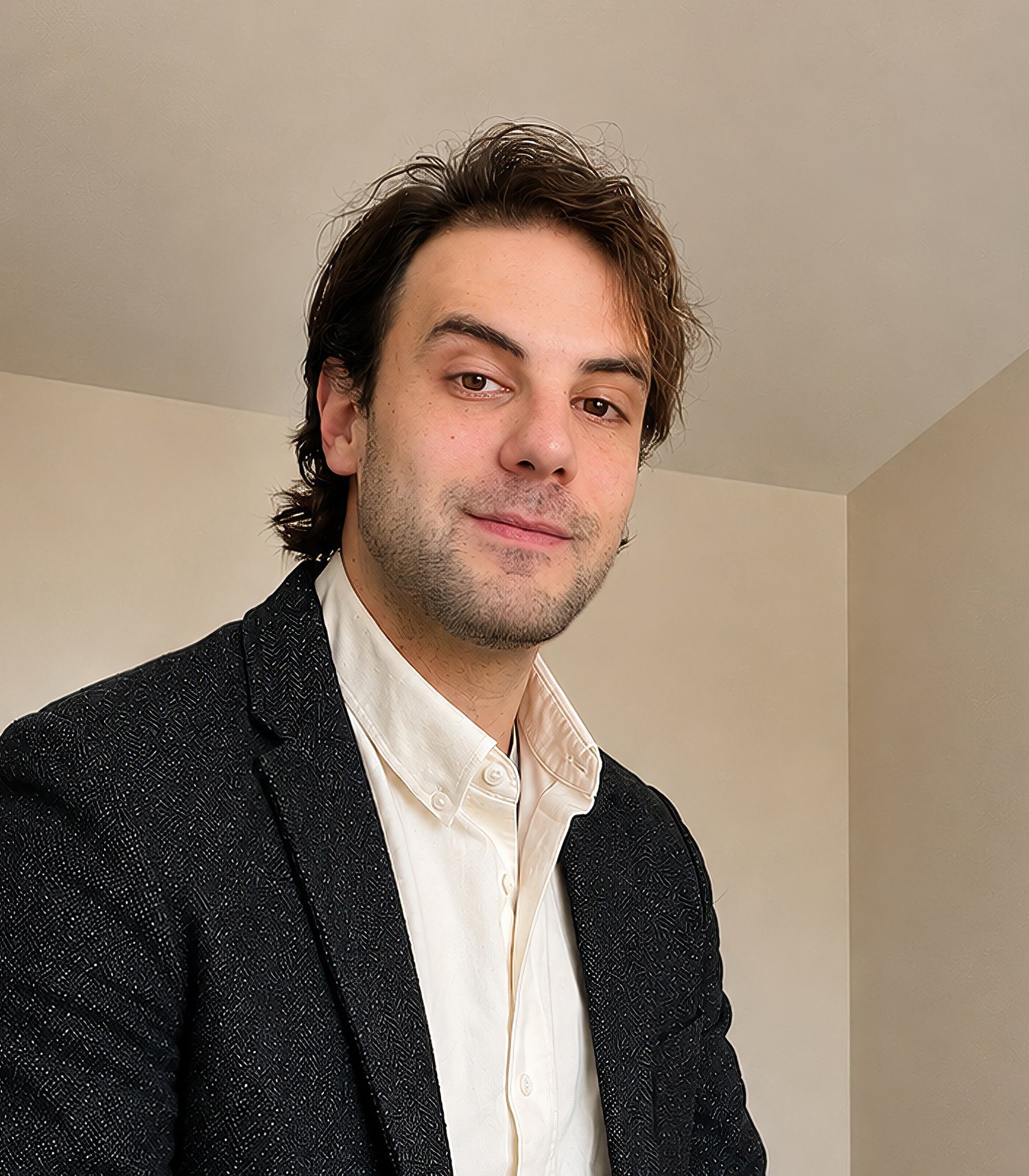 Man wearing a blazer and white shirt