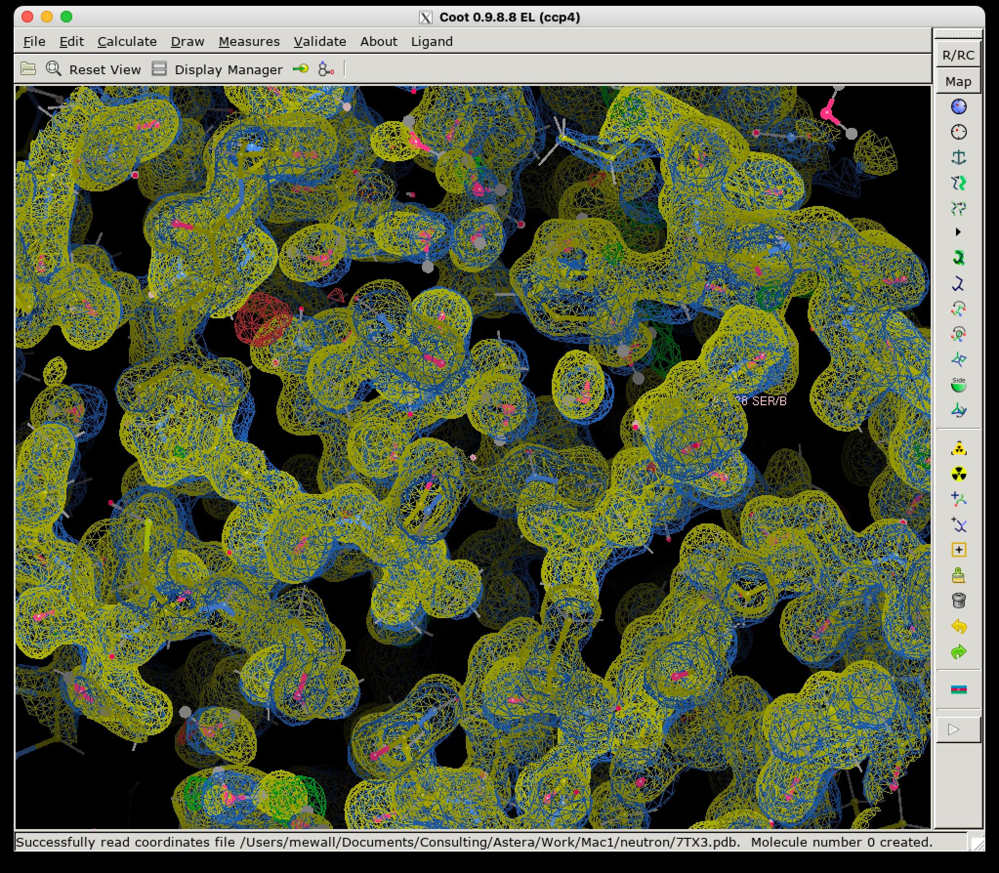Coot molecular modeling interface displaying a protein structure with electron density maps