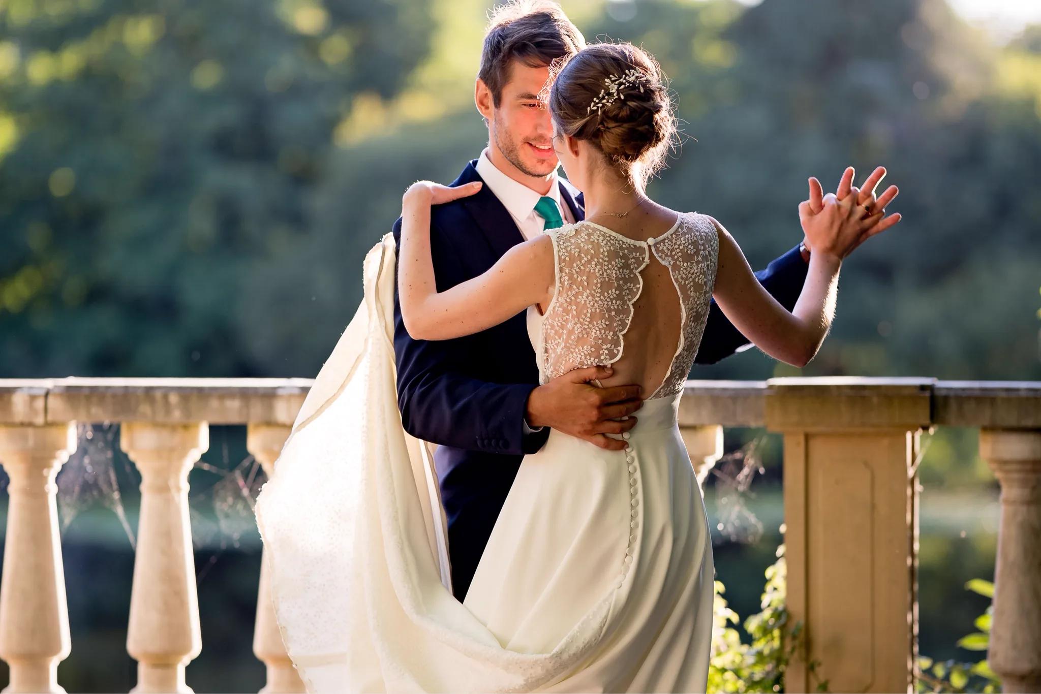 Wedding cocktail by the lake, guests in evening dress