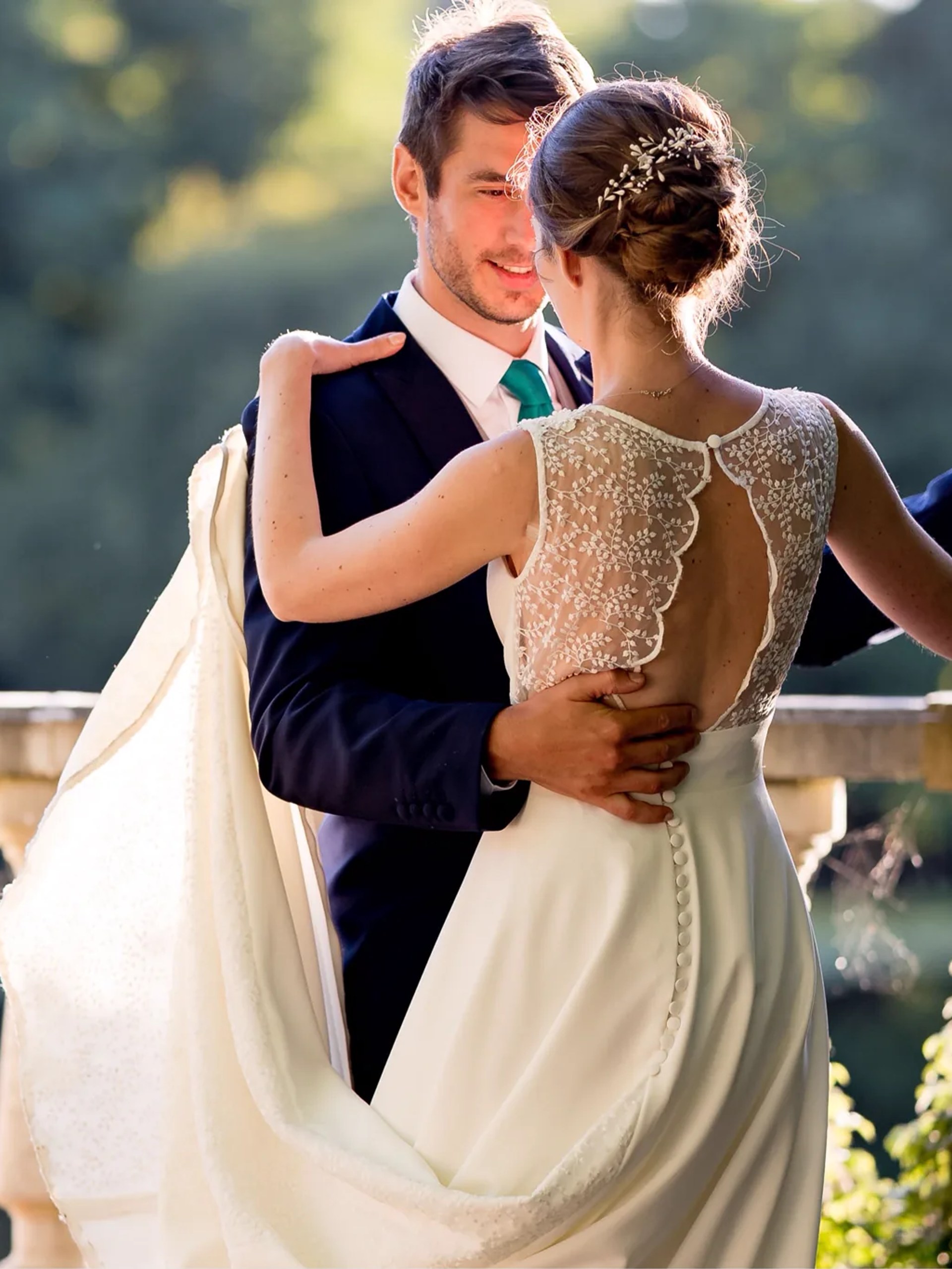 Wedding cocktail by the lake, guests in evening dress