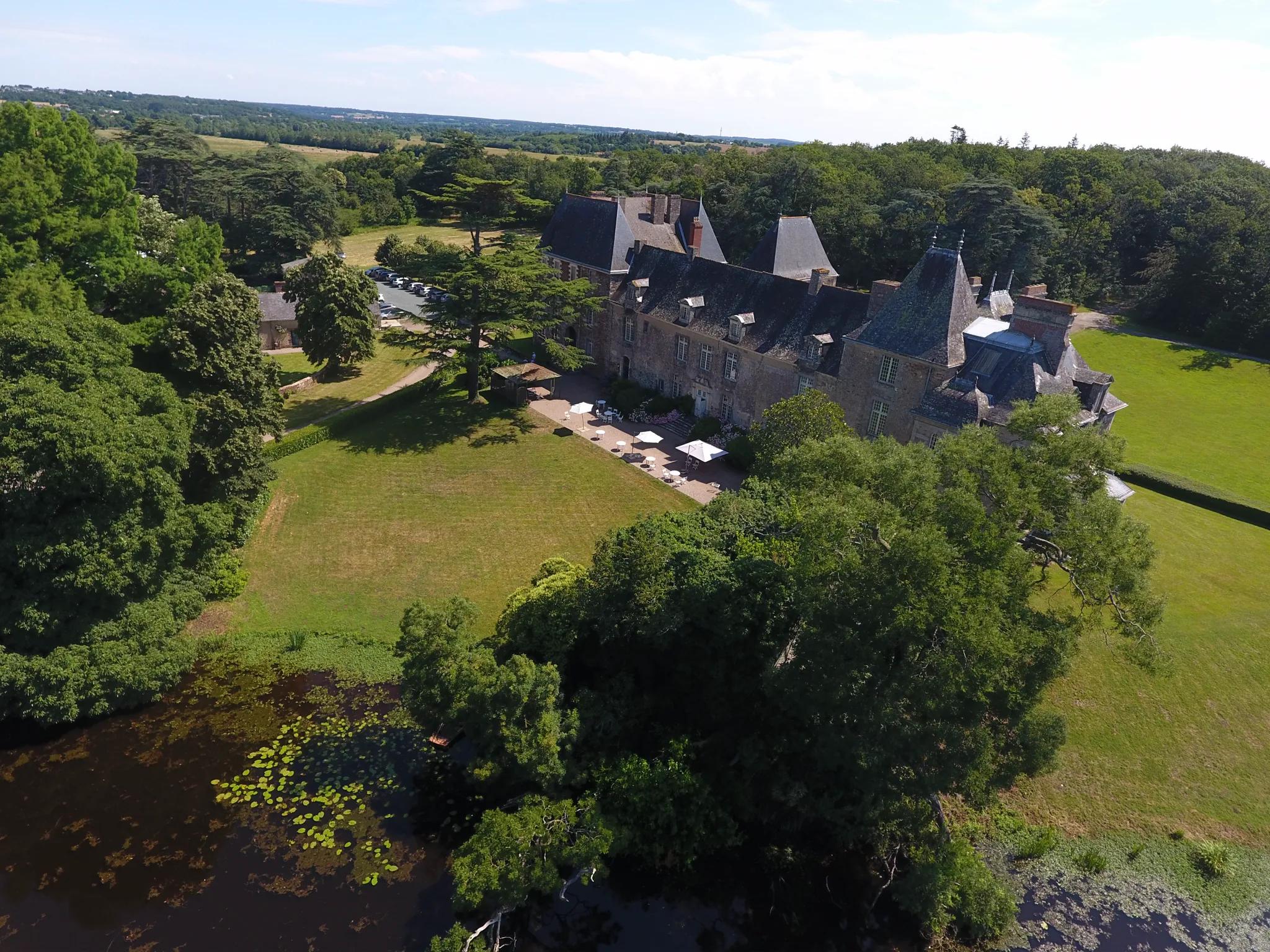 Aerial view of the south front, the set terrace and the lake