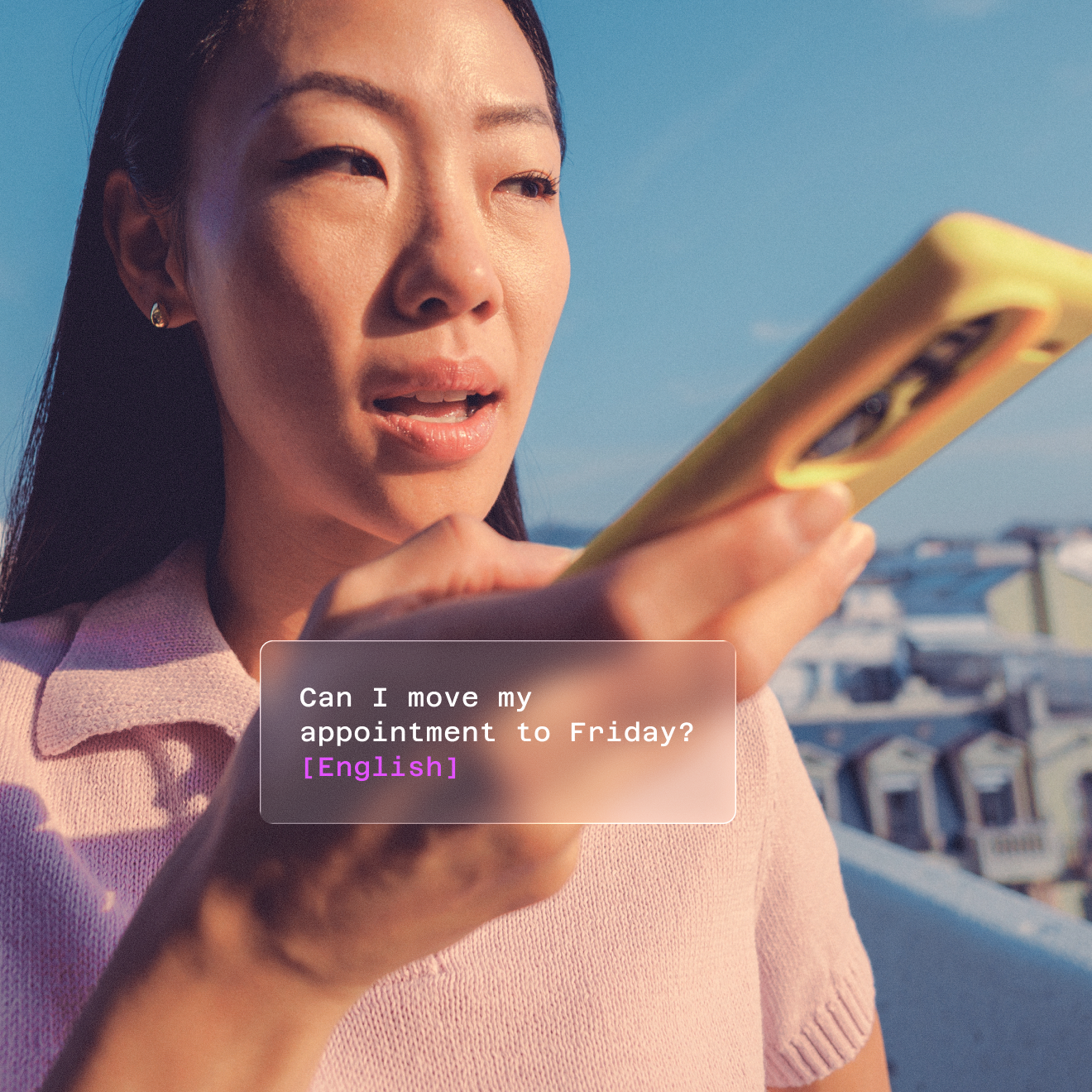 Woman talking to an iPhone