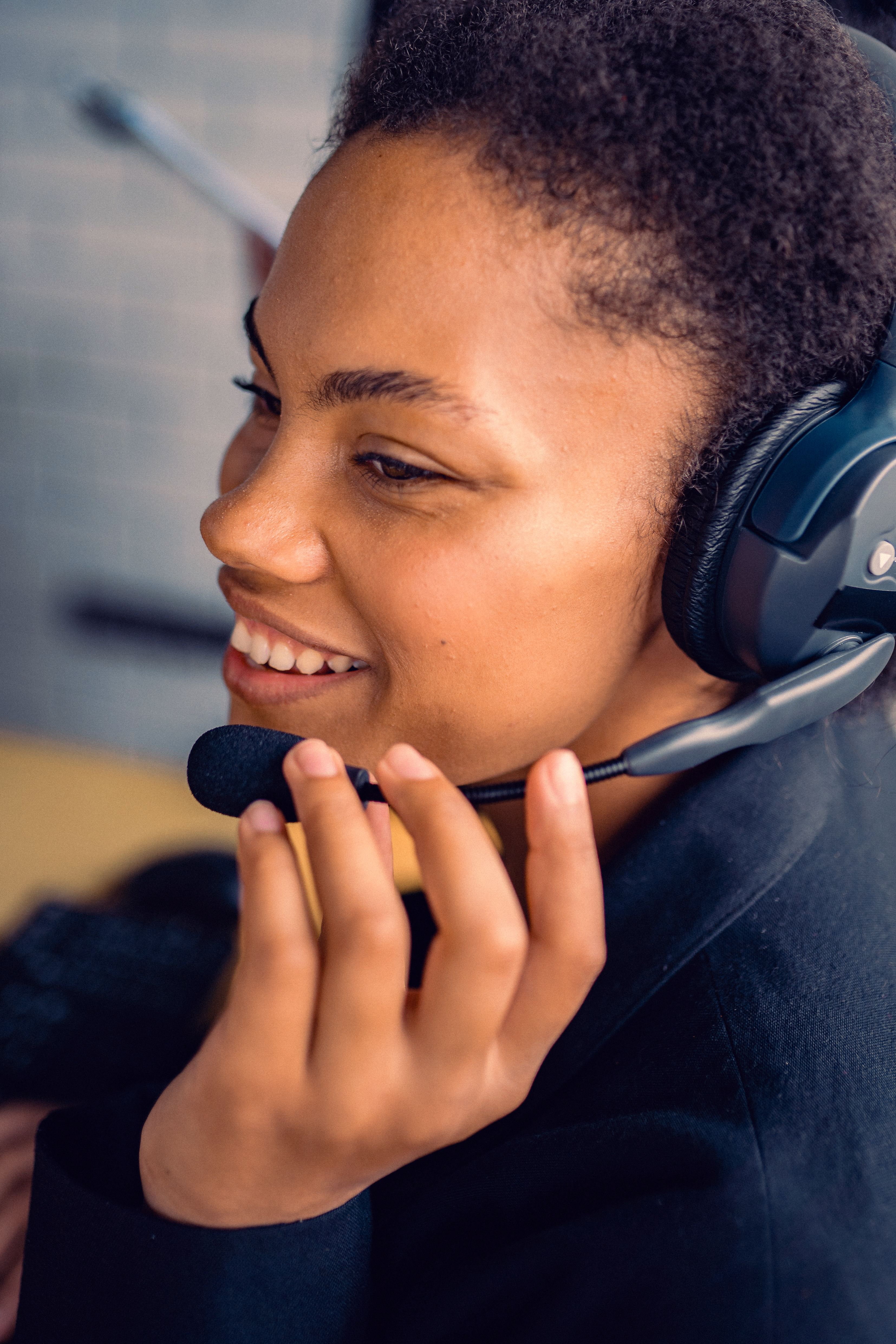 Woman wearing a headset talking