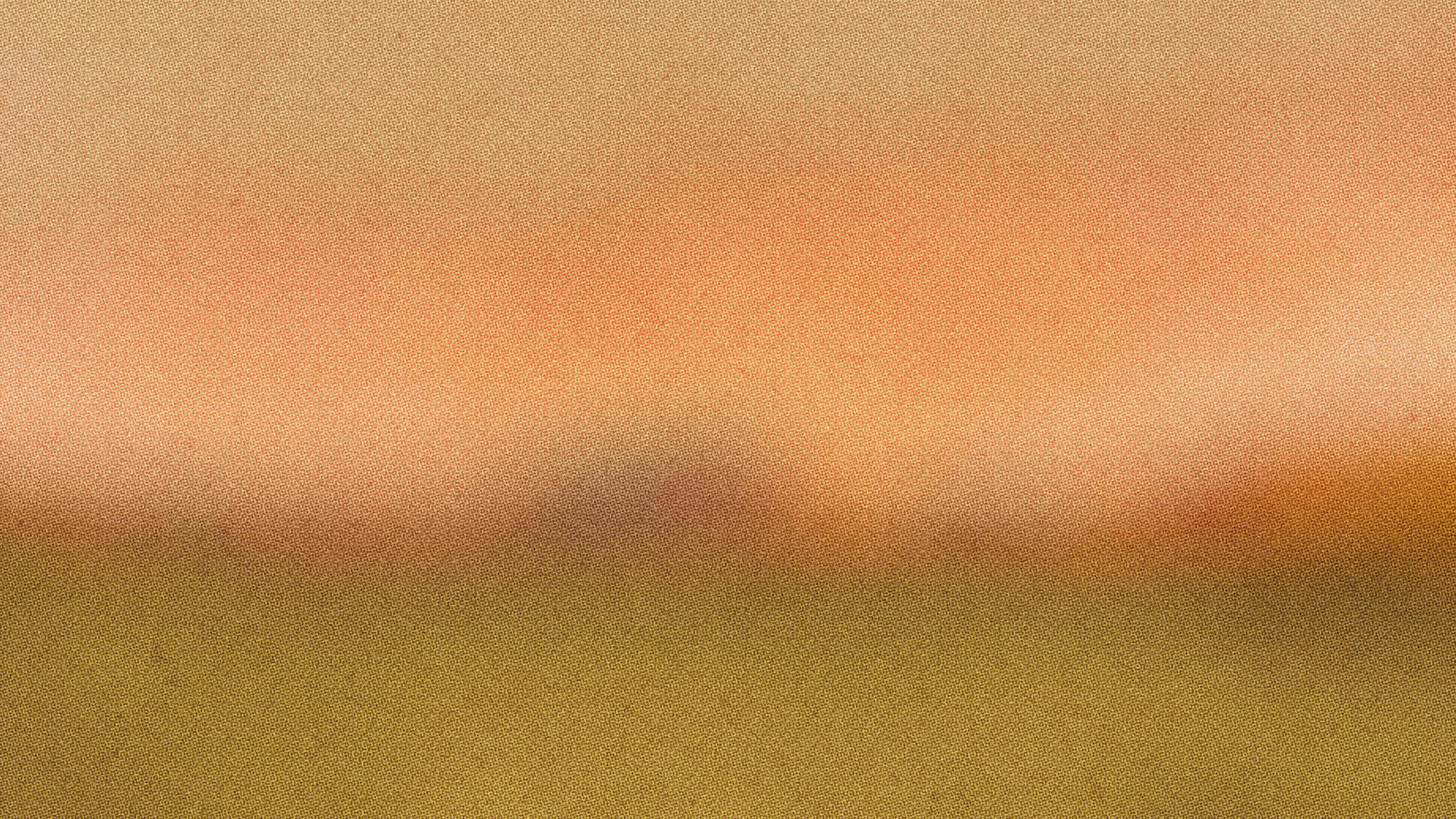 Blurred amber and olive gradient, like a horizon at dusk