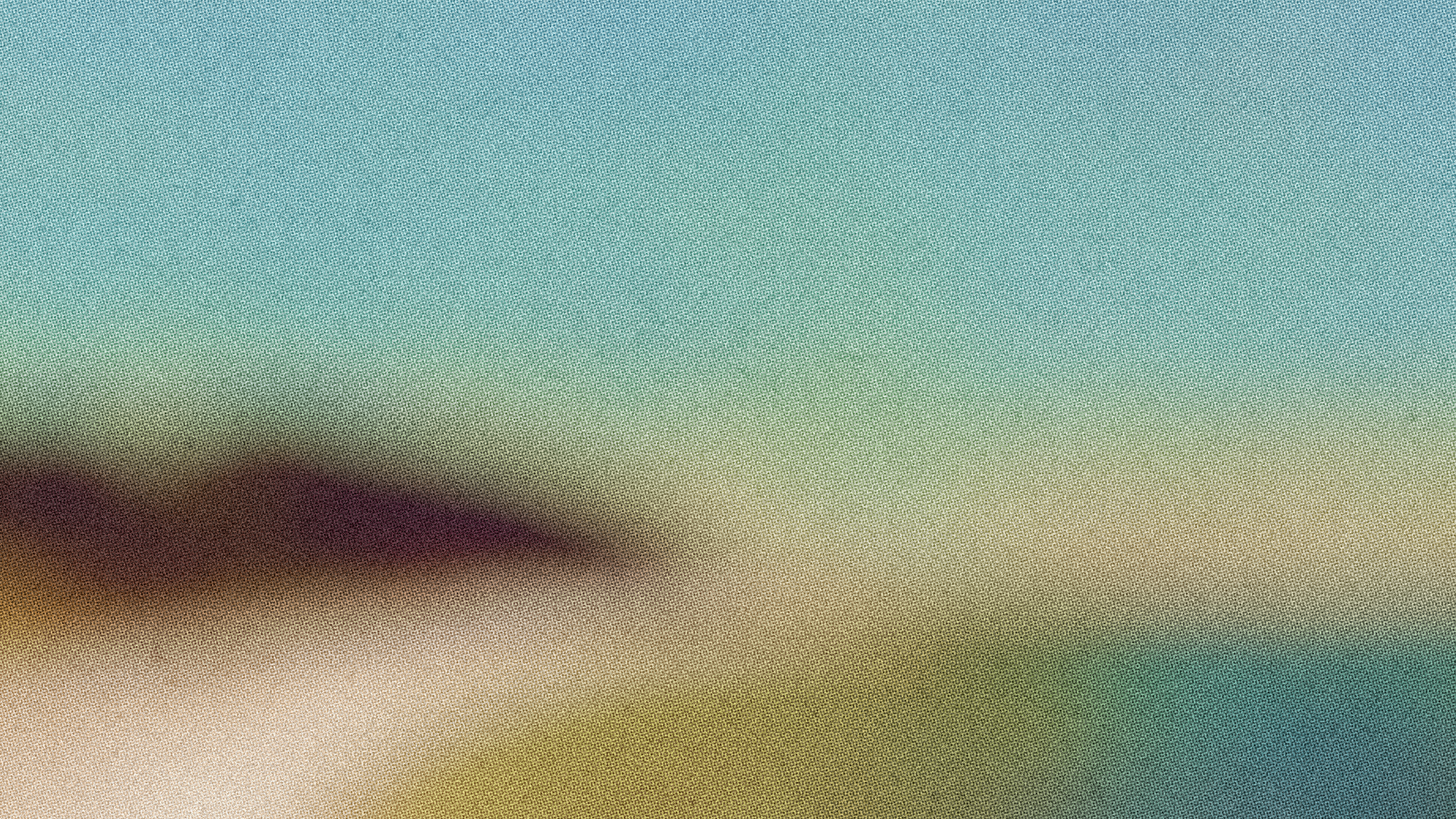 Blurred teal and olive gradient, like a hillside at dusk