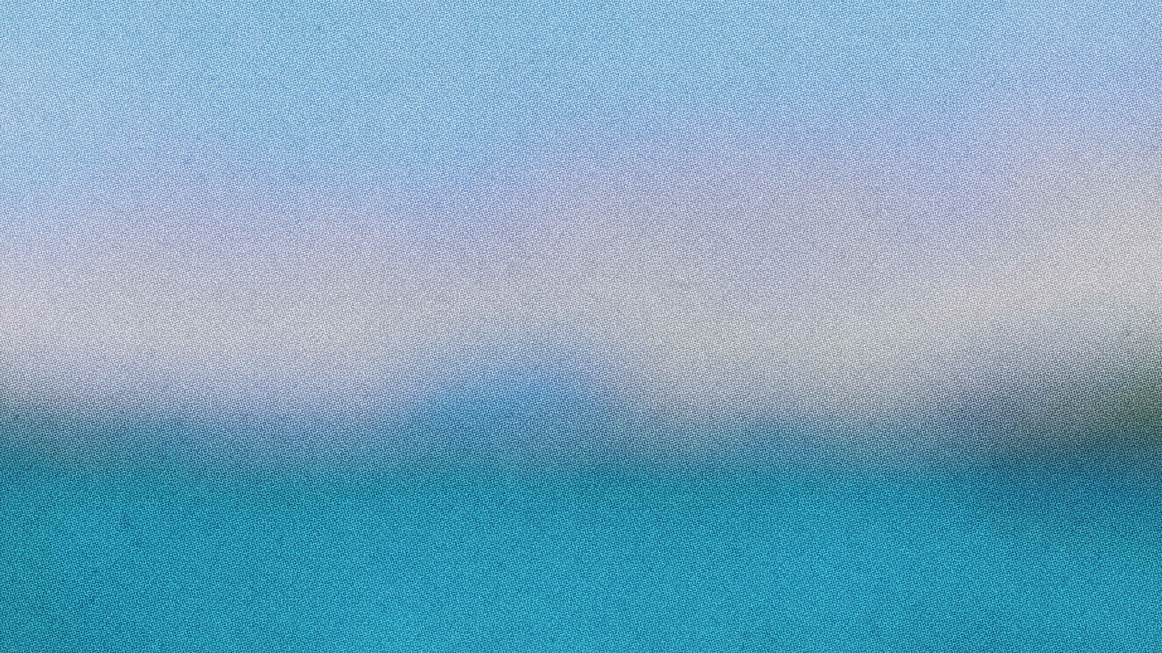 Blurred blue and teal gradient, like a hazy coastline