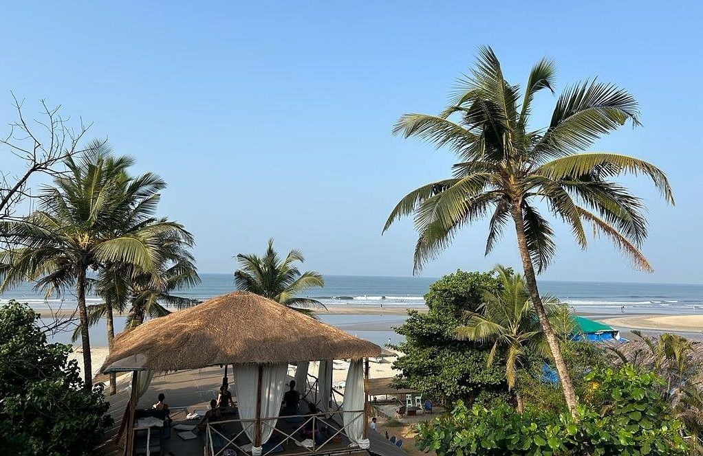 Nalanda Retreat garden and beachfront view Mandrem North Goa