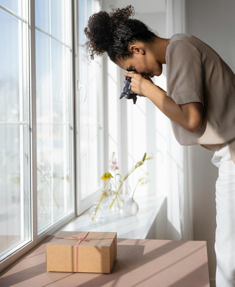 Person taking photo in good light to sell online on jog it on