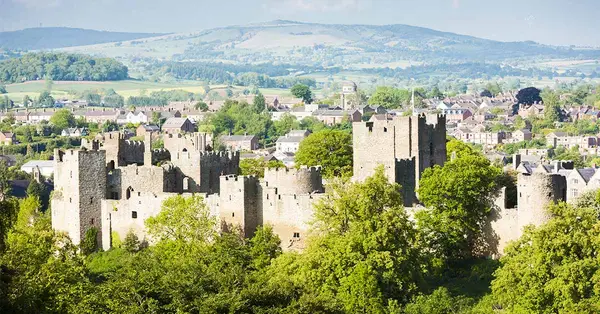 Ludlow Castle ruins overlooking the town and rolling Shropshire hills