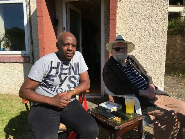 Elderly man with his carer
