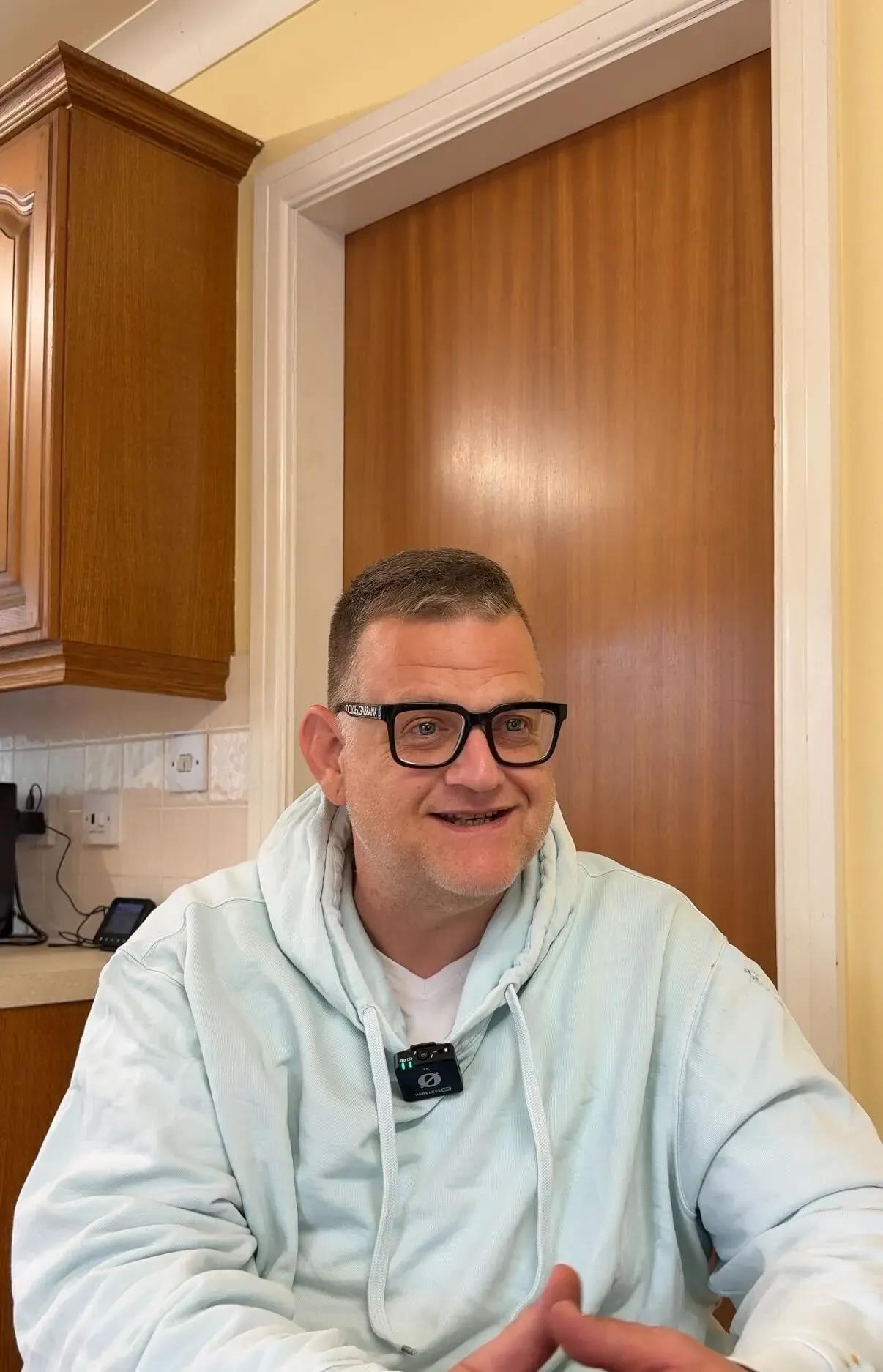 David sitting in the kitchen