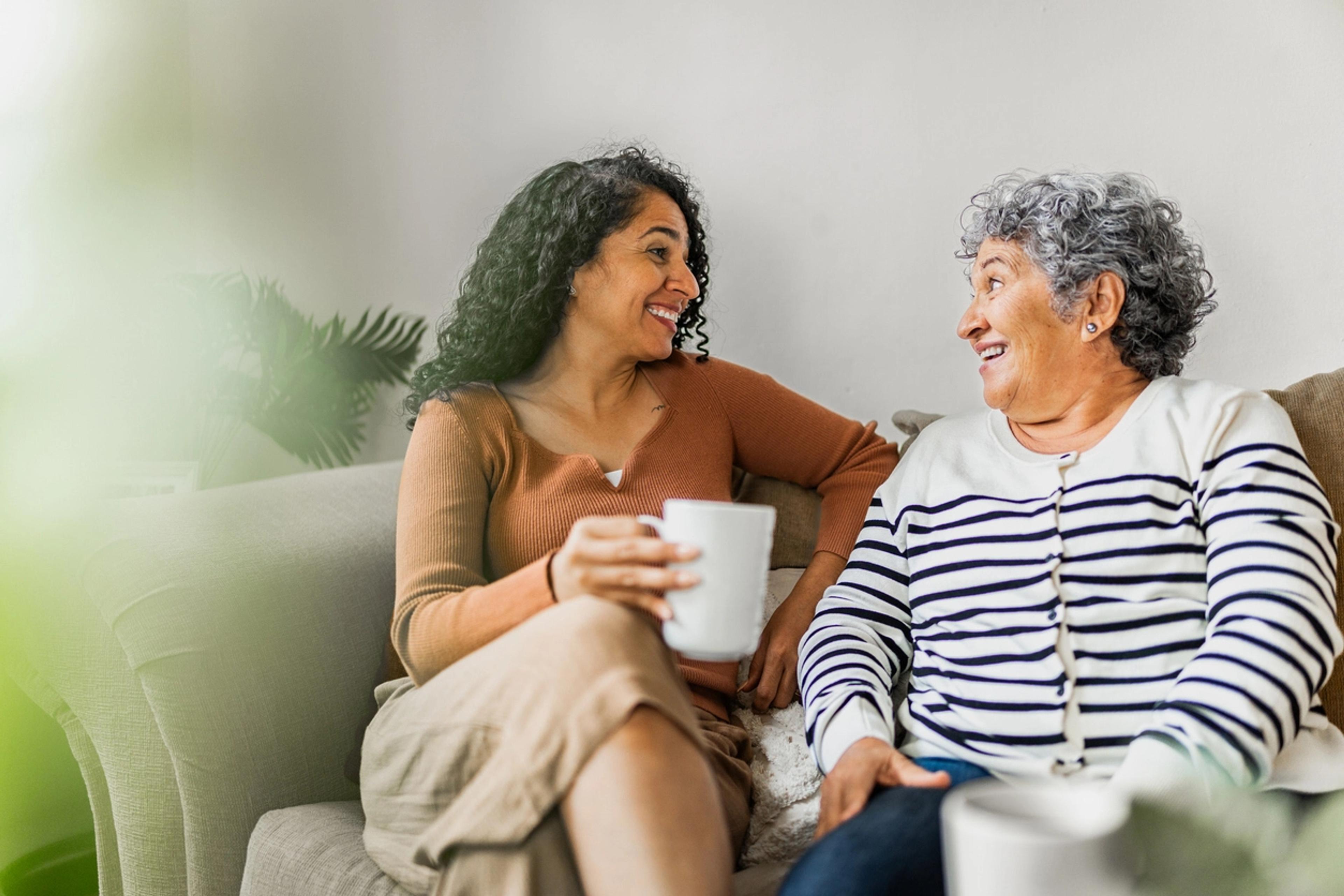 Elderly woman chatting with her daughter