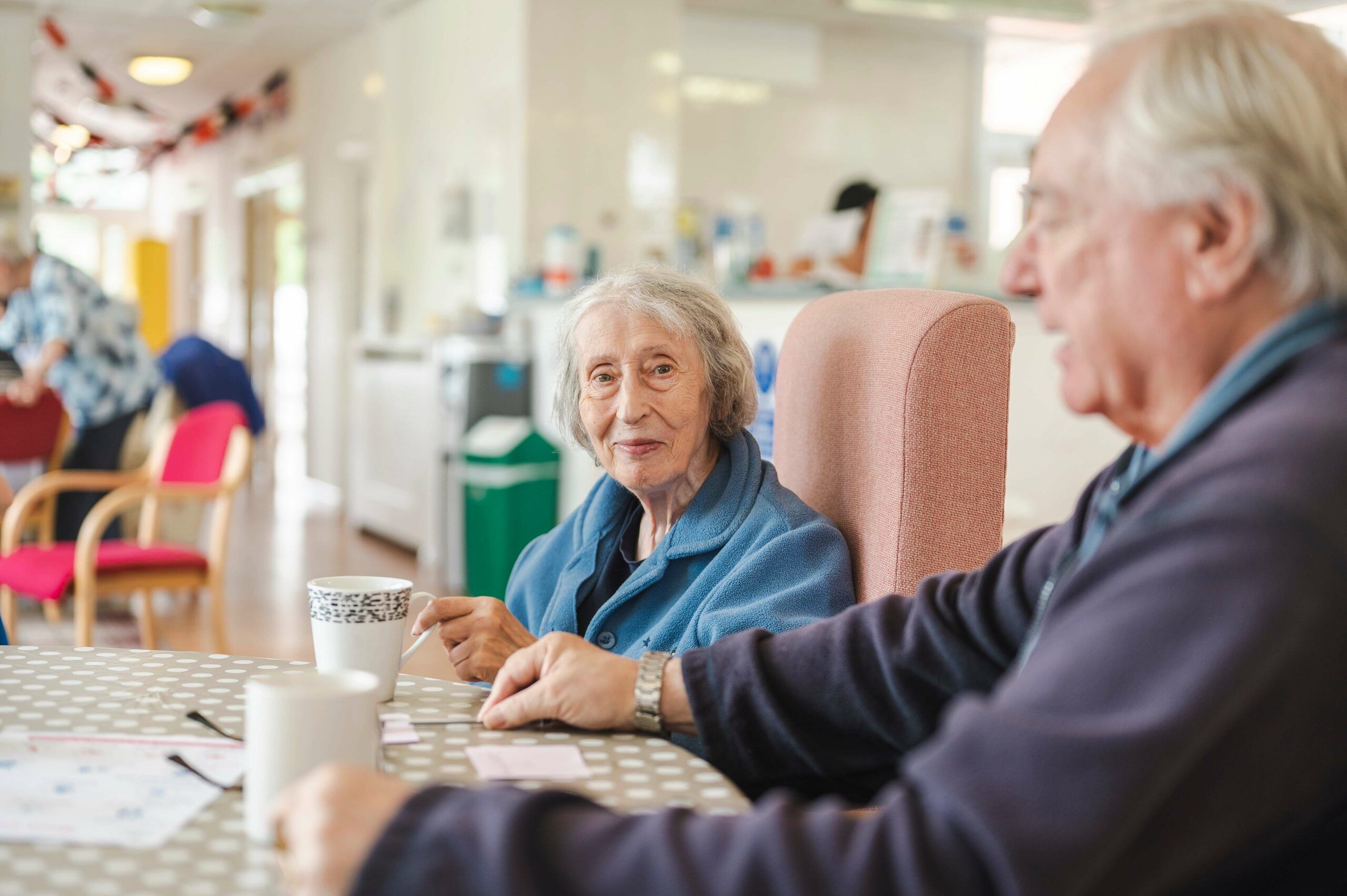 Elderly woman and man in care home