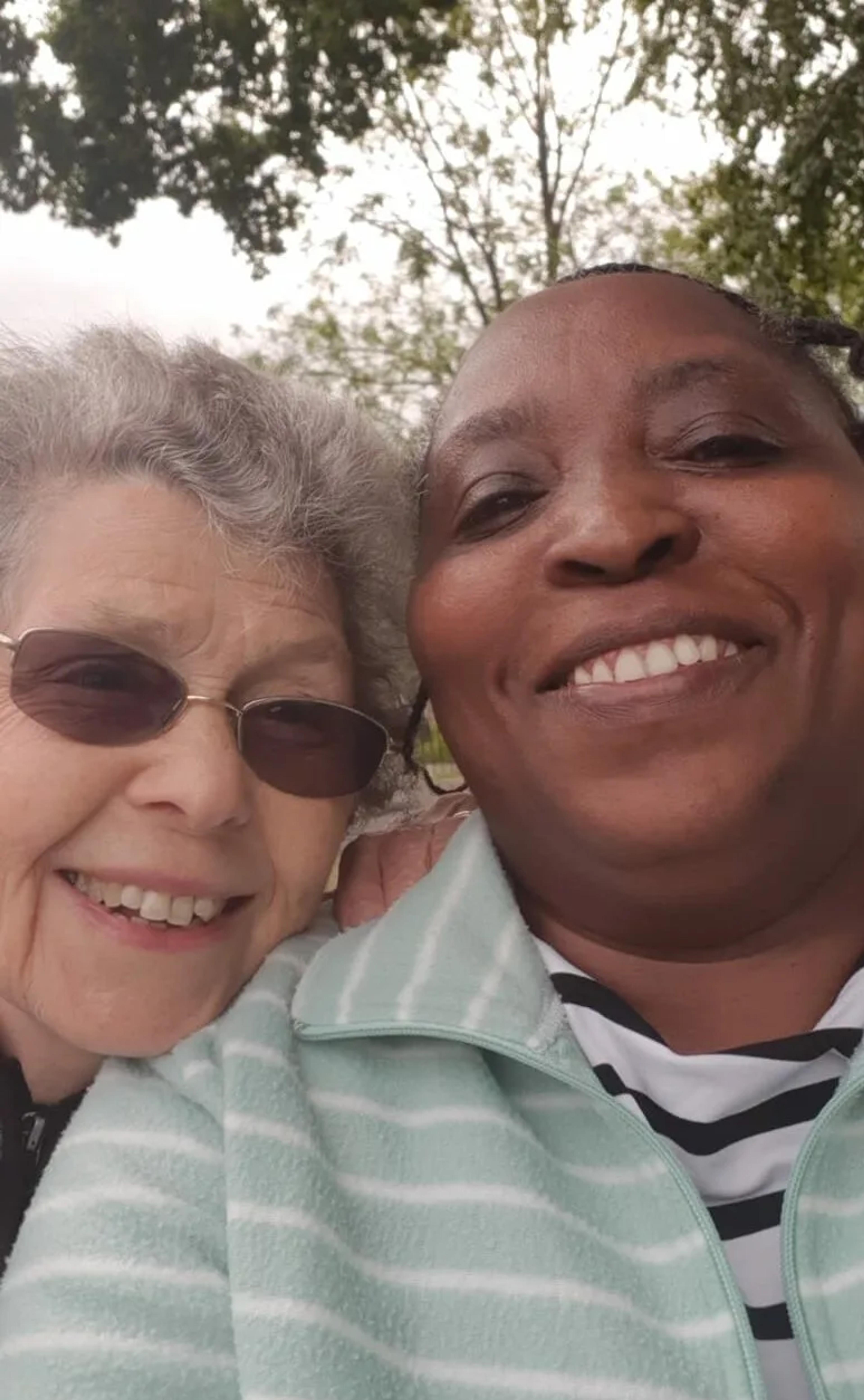 Patricia and her carer at the park