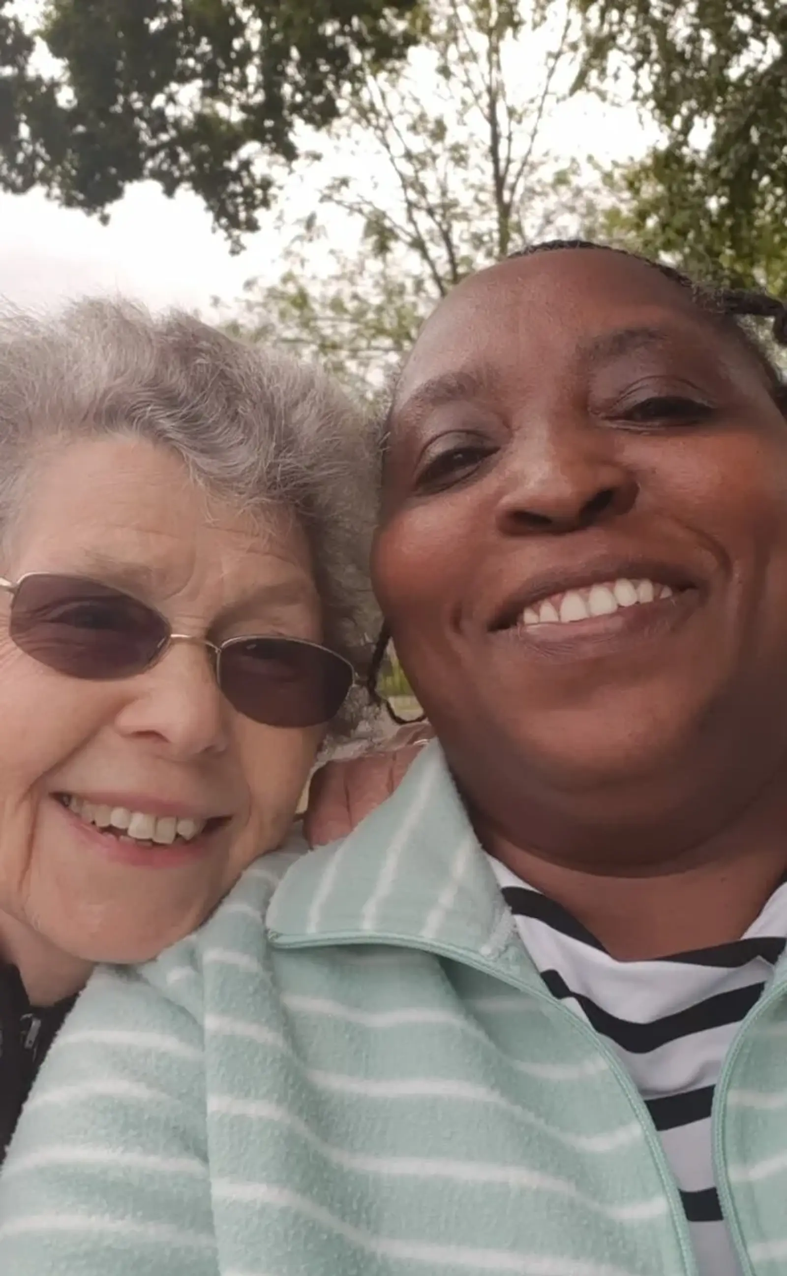 Patricia and her carer at the park