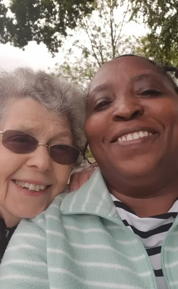 Patricia and her carer at the park