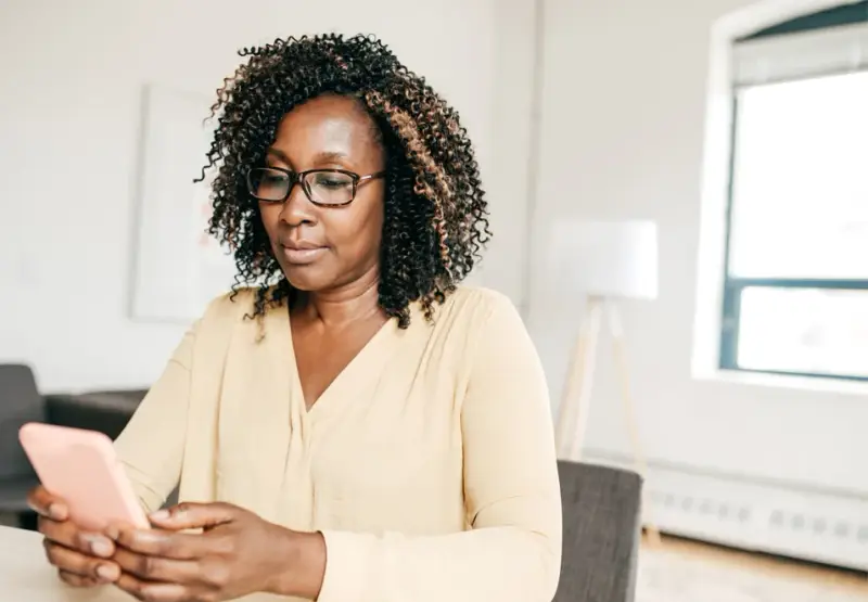 Woman reading from her phone