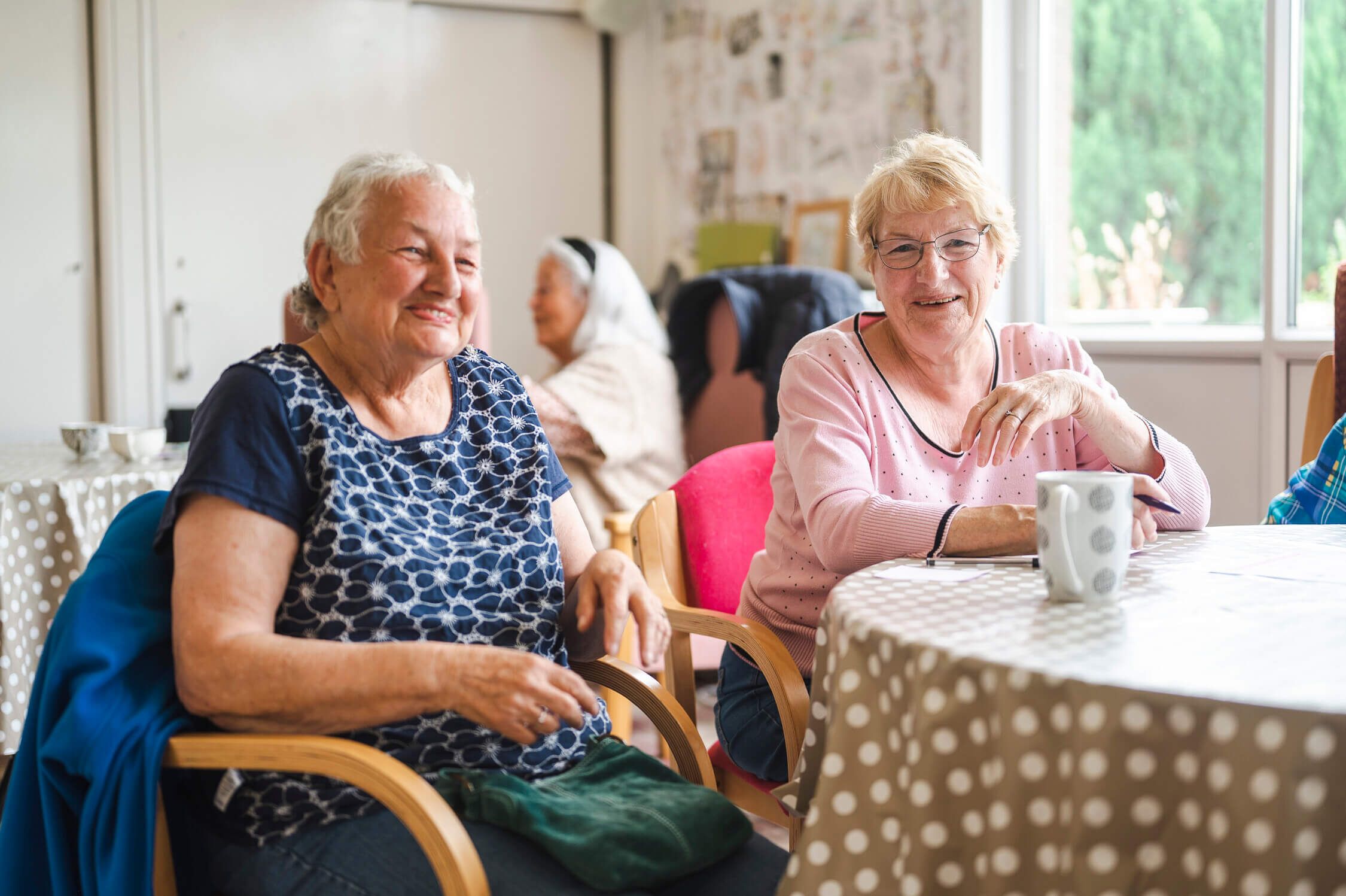 Two elderly women in a hospice