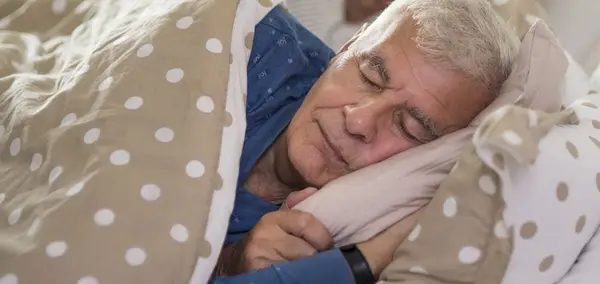 Elderly man asleep