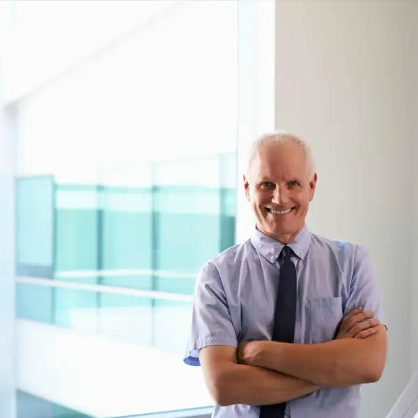 Man standing with his arms crossed