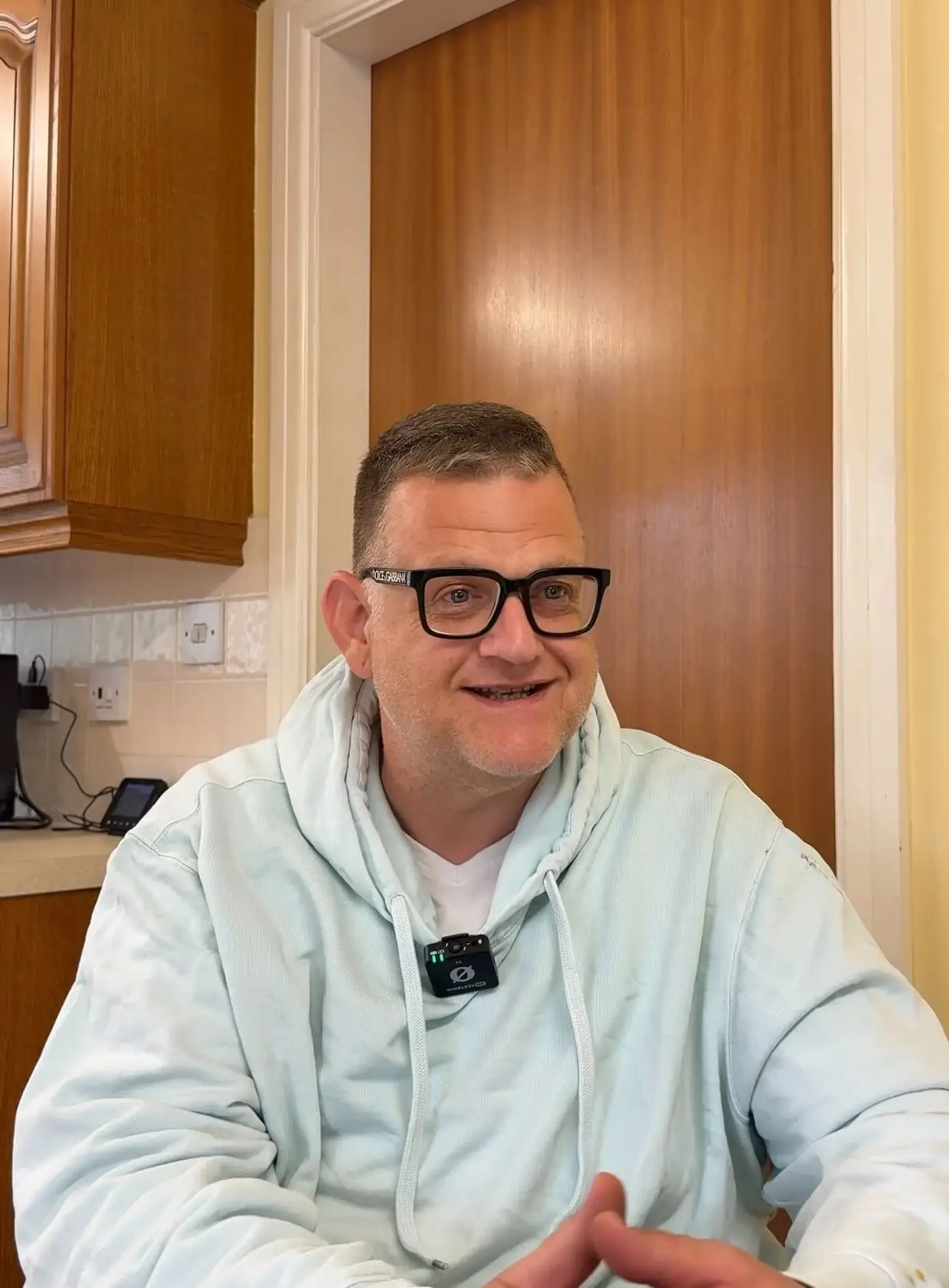 David sitting in the kitchen