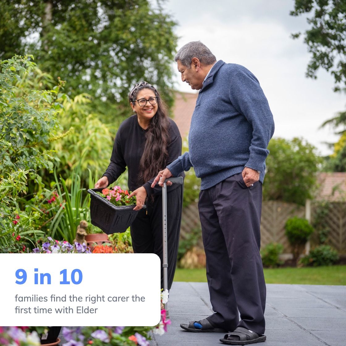 Elderly man with his carer in the garden