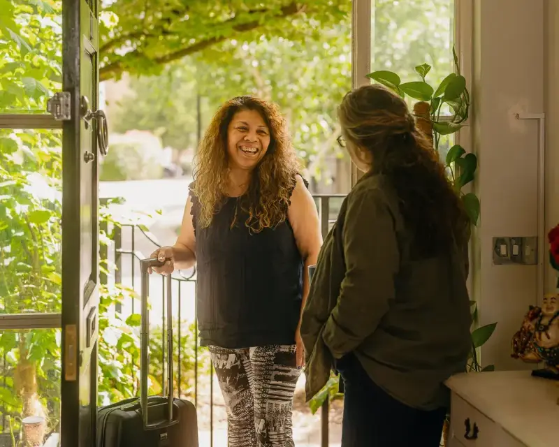 Carer visiting elderly woman